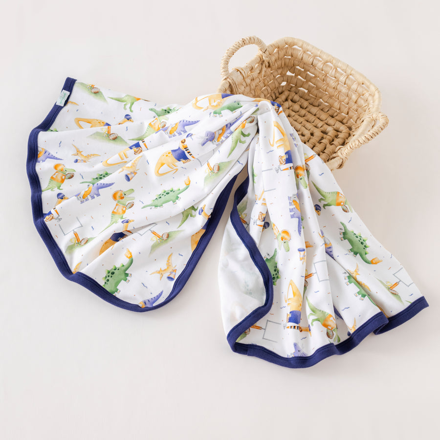 Auburn Dino All-Stars Organic Cotton Swaddle Blanket (Pre-Order Arriving Fall 2025)